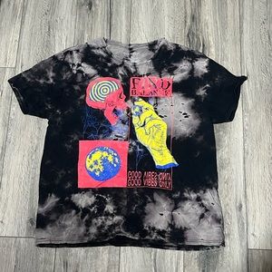 Reverse Tie-dye trippy t-shirt. Very worn with some holes.